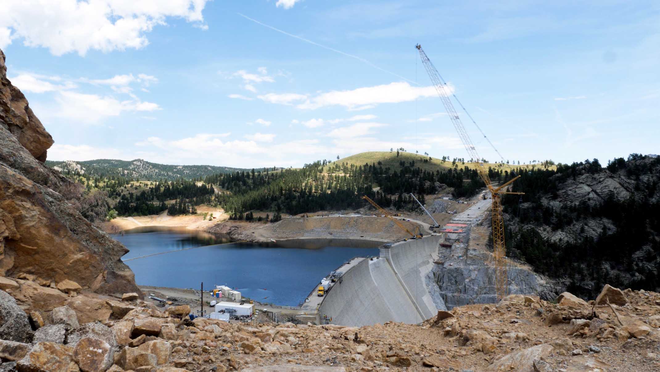 A reservoir with construction equipment