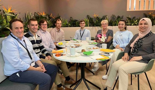 Stantec staff sitting around a table - Craig Scott, Ryan Wilson, Kyle Spriggs, Ross Dodds, Fiona Duncan, Ayat Kuri