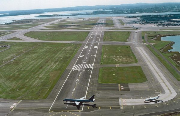 airport runway with plane