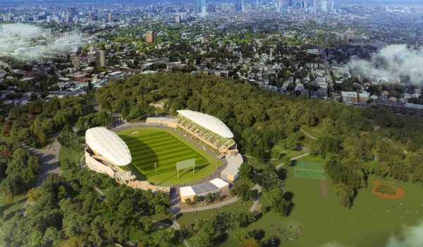 Aerial rendering of a new soccer stadium surrounded by trees, playing fields, and the city beyond