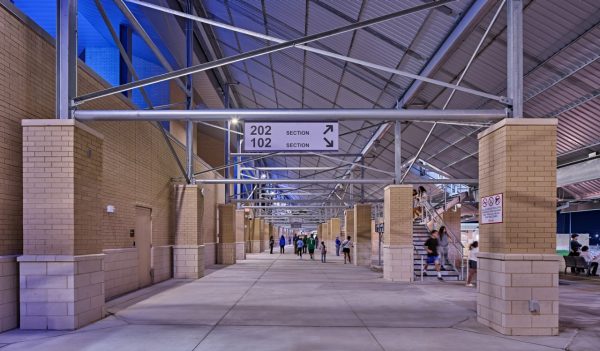 Interior concourse level with brick walls.